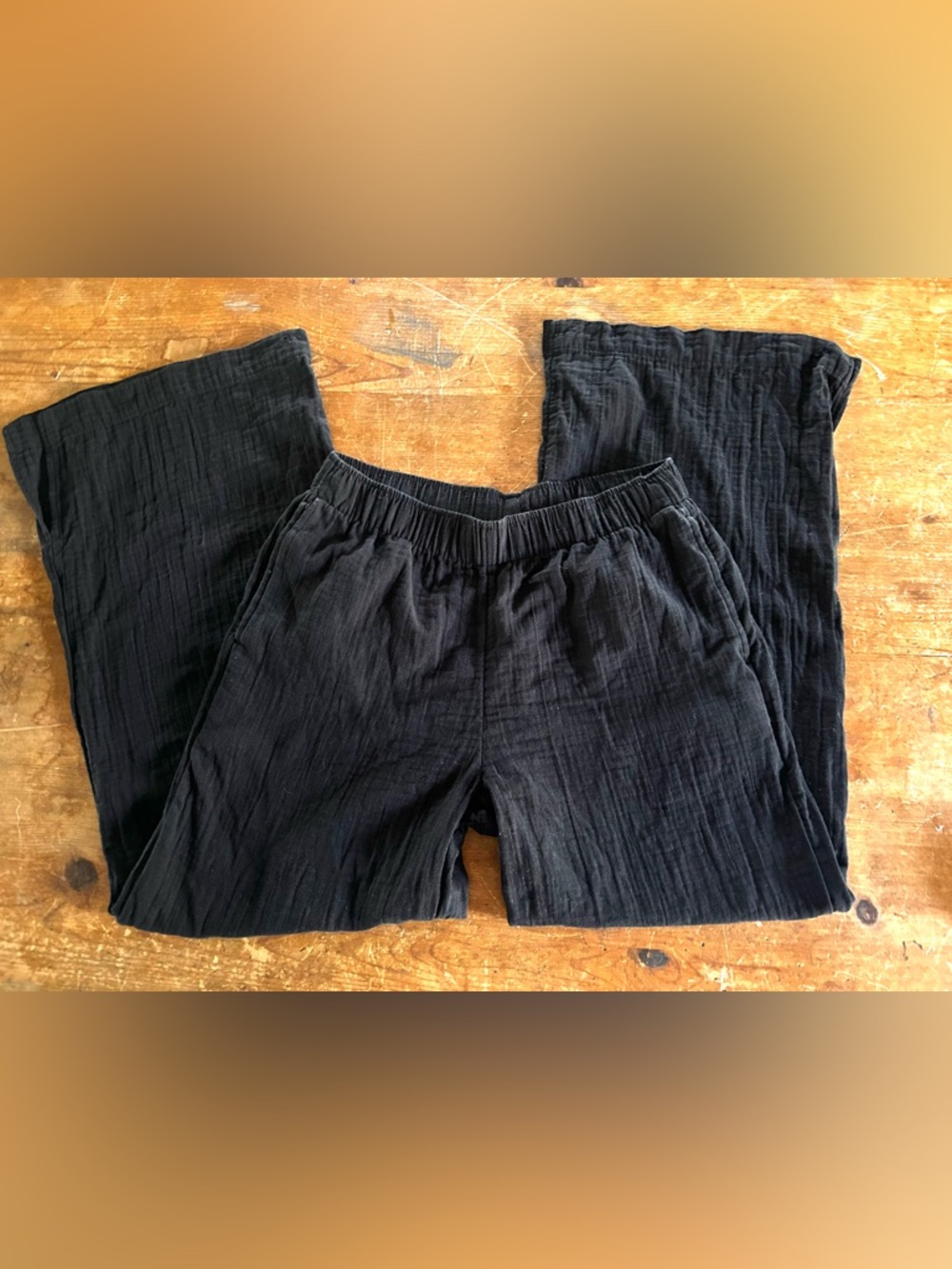 Old Navy black high-waisted crinkle gauze 100% cotton super wide-leg pants.